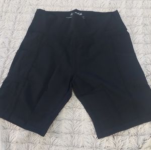 New black 8"‎ yoga shorts size medium